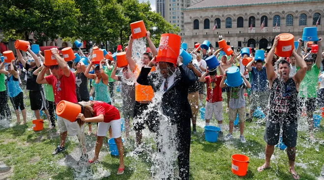 Led by Boston City Councillor, Bostonians take on the ALS Ice Bucket Challenge (Photo Credit: Elise Amendola, AP)